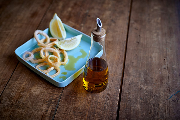 Olive oil and slices of lemon